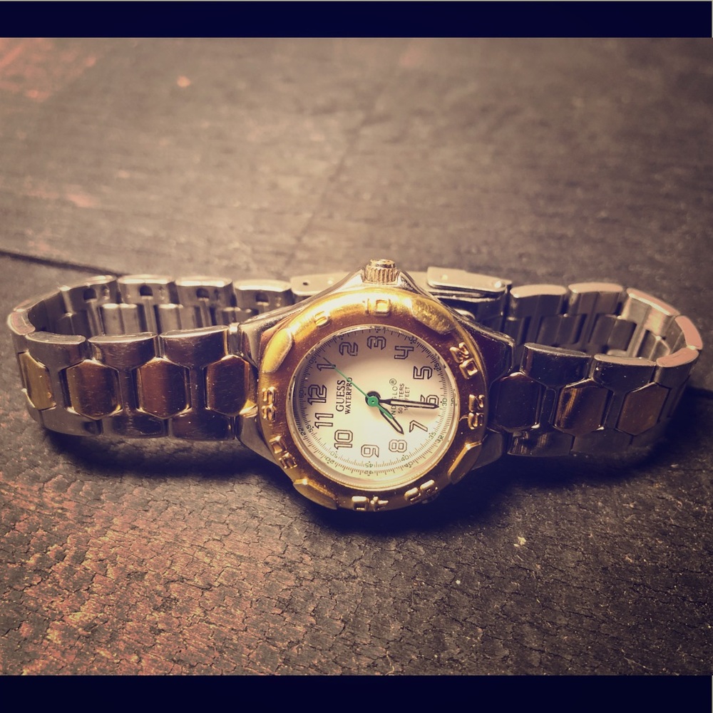 Guess Silver and gold women’s time piece watch